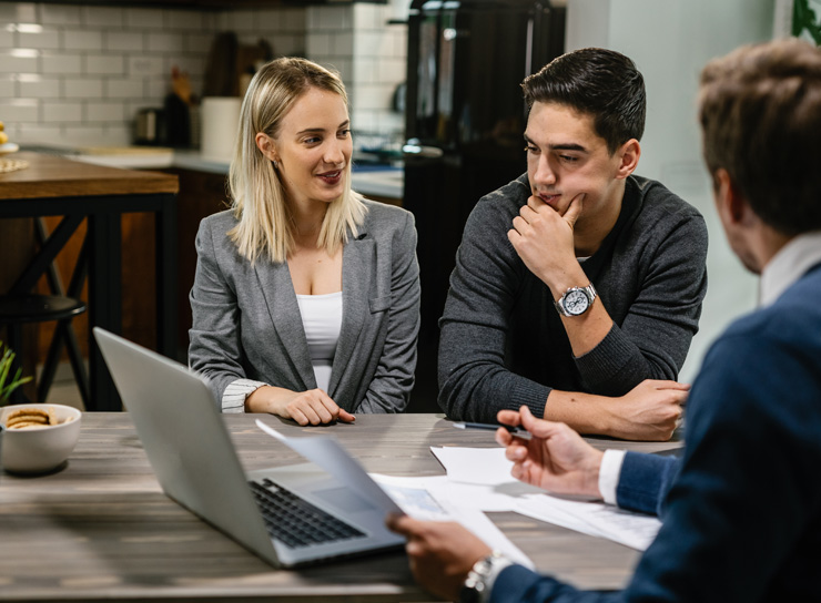  Business owner meeting with NeuLoans finance broker reviewing business documentation, ABN registration, and vehicle finance application for chattel mortgage approval